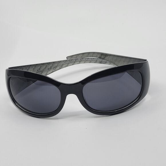 Calvin Klein R511SS Sunglasses Black plastic frame wrap 130mm - Picture 1 of 14